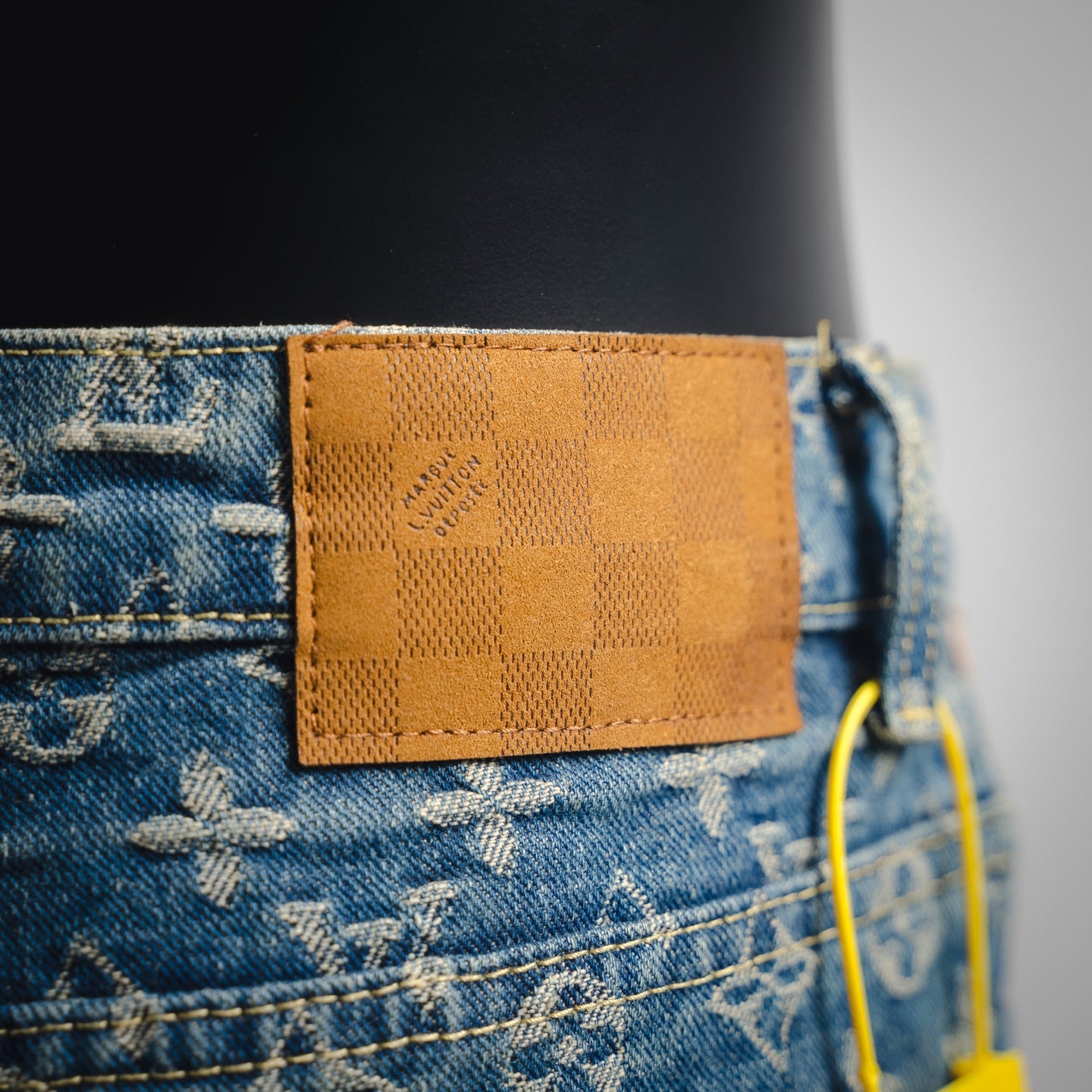 1V Jacquard side leather jeans