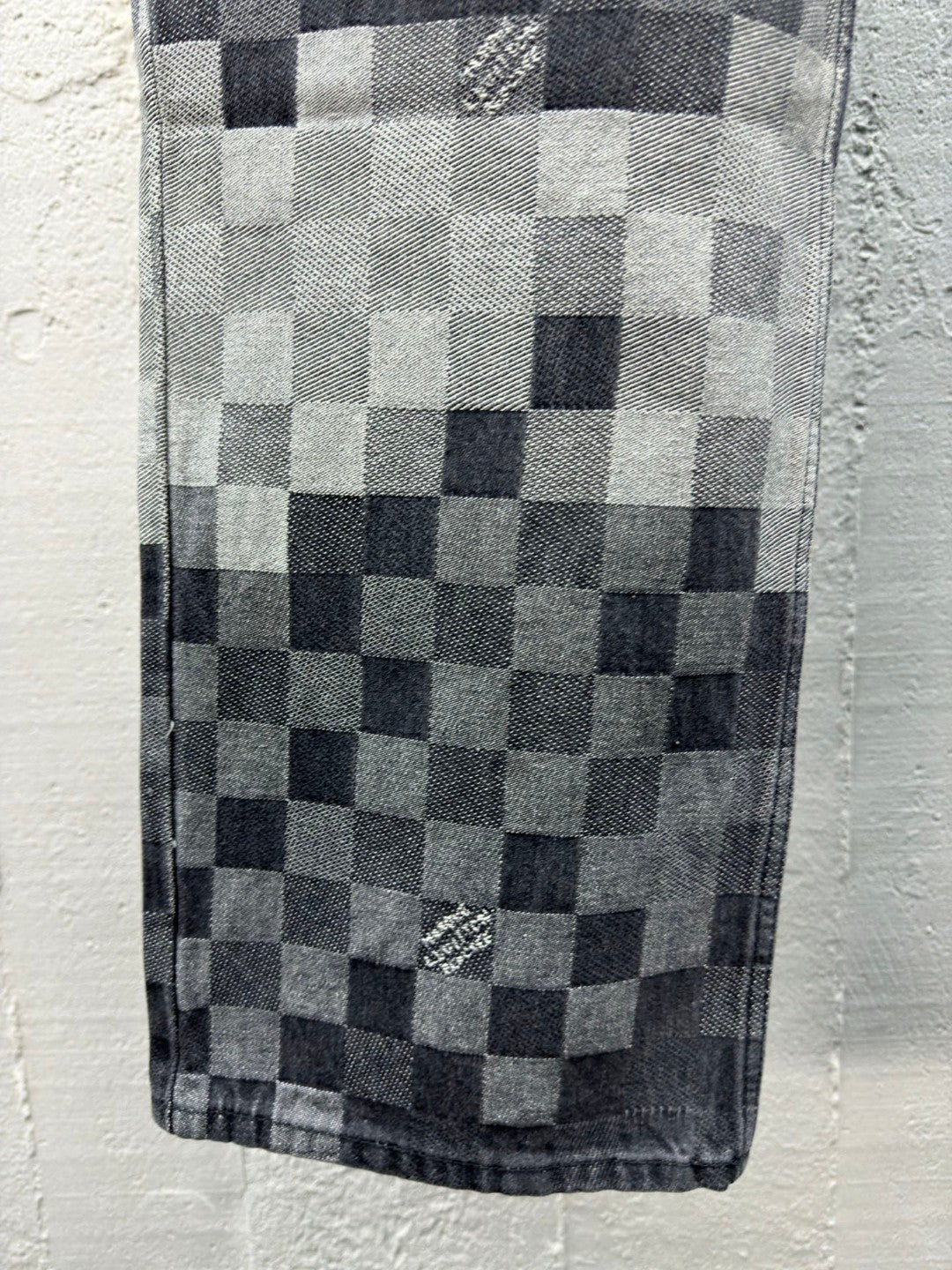 1V SS25 checkerboard mosaic jeans