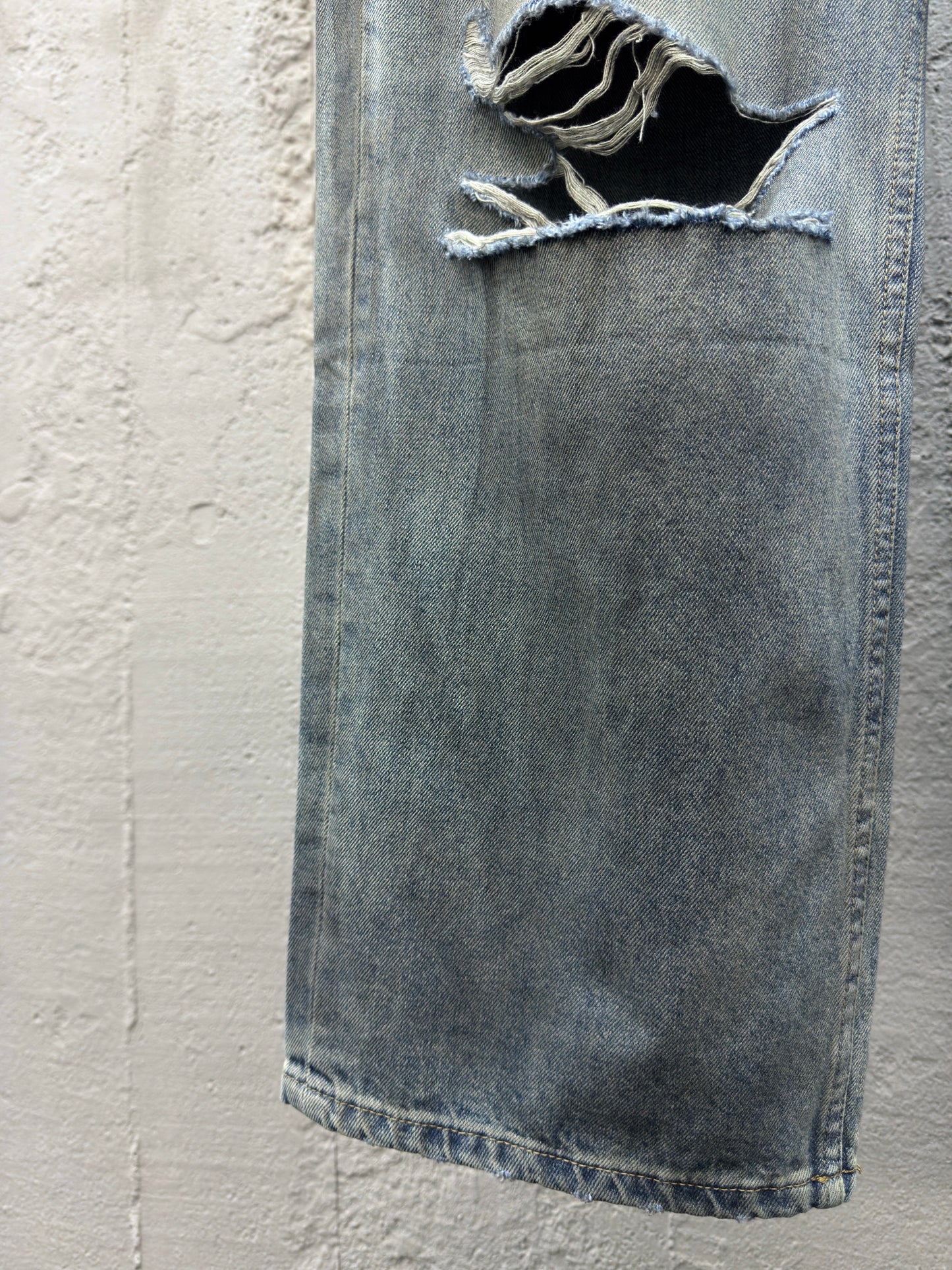B jeans with fringe rips