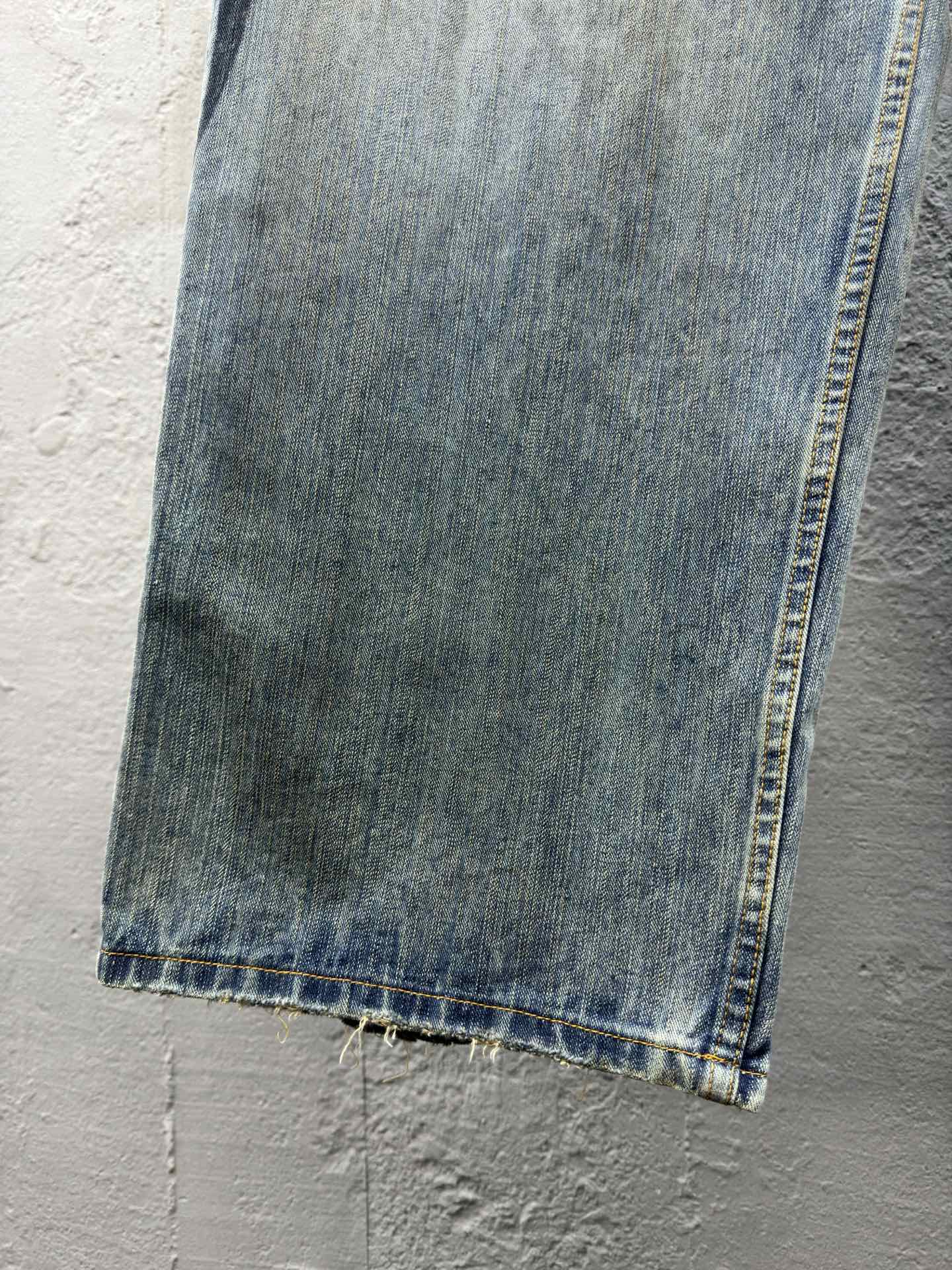 B  dragon print jeans