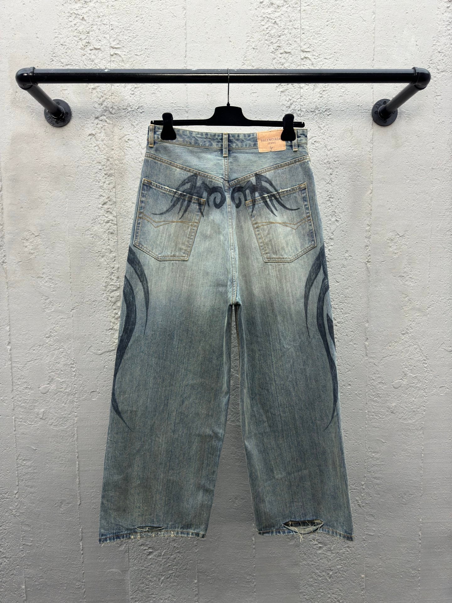 B  dragon print jeans