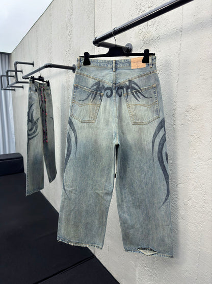 B  dragon print jeans