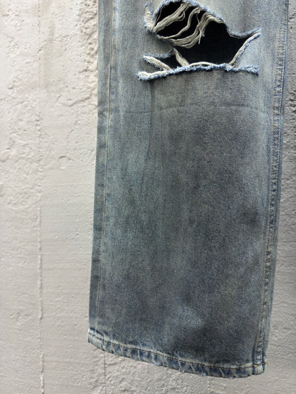 B  jeans with fringe rips